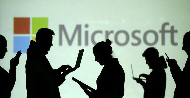 Microsoft warns of forex hit, cuts forecast By Reuters